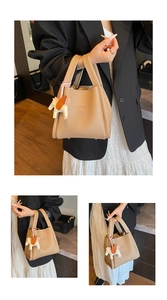 Elegant niche bucket bag for women, new 2025 autumn leather handbag with cute horse charm.