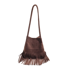 Retro dark brown suede bucket bag featuring long fringe tassels and a slim shoulder strap