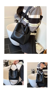 Detailed views of a black leather bucket bag with white contrast stitching and shoulder strap