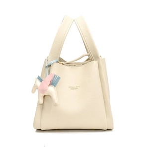 Chic Korean style PU leather bucket bag featuring a cute winged horse charm for daily fashion.