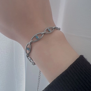 Hip hop silver chain bracelet with blue eye charms and adjustable extender for women