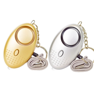 Dual pack personal security alarm in gold and silver with loud siren and LED light