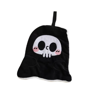 Halloween skeleton hanging hand towel in soft coral fleece with a cute grim reaper design