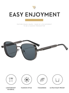 Detail of square steampunk sunglasses with metal frame and spring hinge mechanism