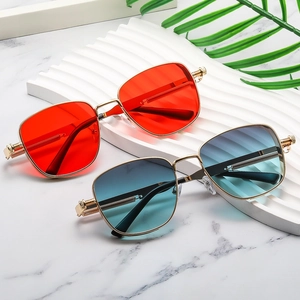 Steampunk sunglasses detail featuring industrial spring hinges and colorful lenses