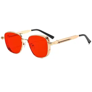 Detail view of steampunk metal frame sunglasses with spring hinge and orange lenses