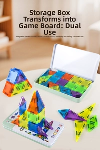 Detail of colorful magnetic building tiles with a metal storage box base and 3D shapes