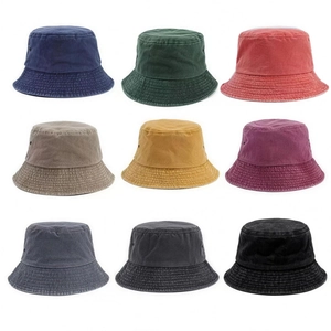Grid view of washed denim bucket hats in nine assorted vintage colors with metal eyelets