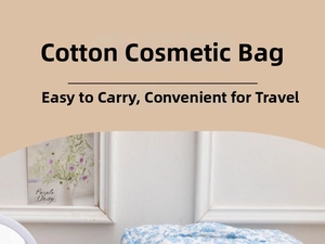 Close-up of portable cotton makeup bag with blue floral pattern and soft texture