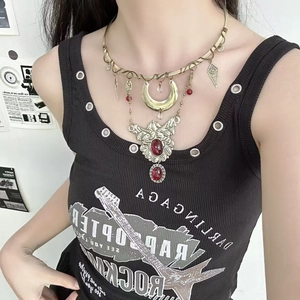 Vintage bronze layered necklace with red gemstones and bohemian crescent moon pendants