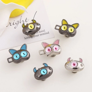 Set of 6 cartoon monster alloy waist adjusters with colorful enamel on white background