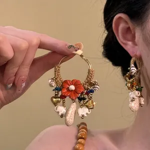 Bohemian large hoop earrings with resin flowers, shell charms and tassels