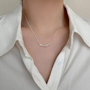 Elegant 925 sterling silver necklace featuring a double feather pendant for women