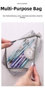 Macro shot of gray mesh pencil case with zip closure showing internal capacity and pens
