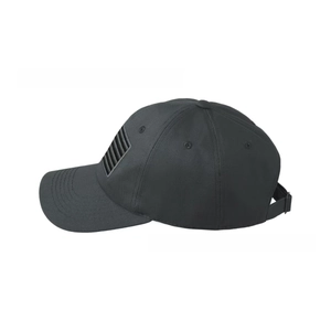 Detail of a black washed baseball cap with American flag patch and adjustable back strap