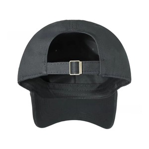 Rear view of black vintage baseball cap featuring adjustable metal buckle and twill cotton