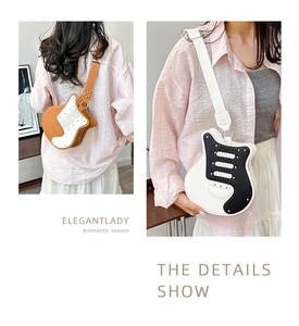 Detail of creative violin guitar shaped shoulder bag with wide adjustable strap