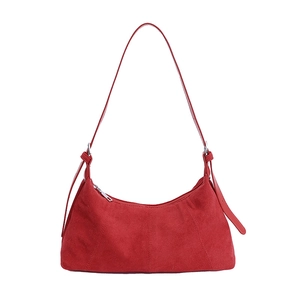 Chic red matte suede shoulder bag with adjustable strap and silver hardware detail