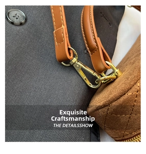 Detail of brown quilted suede bucket bag with gold hardware and precise stitching
