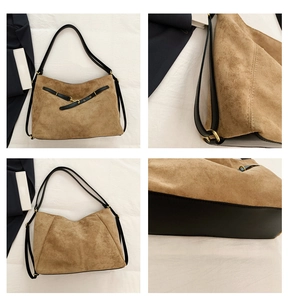 Detalle del bolso tote retro grande con costuras en contraste y detalles de hebilla metálica
