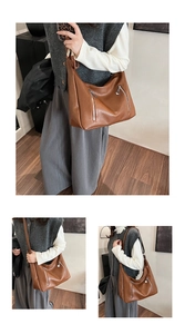 Detailed views of a brown vintage hobo bag with zip accents and braided handles