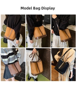 Detail showing high-quality suede bucket bag in brown and black with leather trim