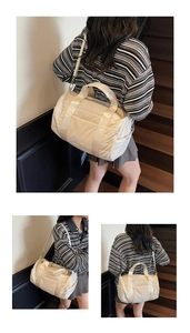 Detailed views of a beige quilted canvas cylinder travel bag with shoulder strap