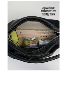 Top view showing the large interior capacity of the black pebble leather tote bag