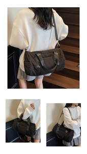 Multiple views of a black quilted cylindrical travel bag shown on a model for scale