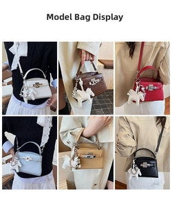 Detail view of crocodile pattern Kelly handbags in six colors with Pegasus charms