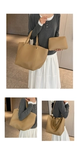 Detail view of khaki leather bucket bag set showing large tote and inner pouch