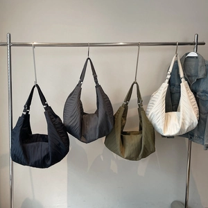 Large pleated nylon dumpling bag in black, grey, green, and white colors for women