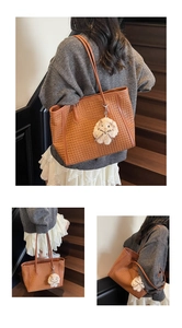 Detailed views of a brown woven tote bag with a plush bunny charm on a wooden staircase