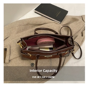 Macro view of spacious internal capacity with compartments for leather tote bag