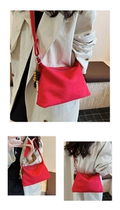 Close-up views of a red crescent shoulder bag on a model in a beige trench coat