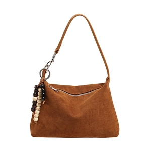 Brown suede shoulder bag for women, chic hobo pillow bag with wooden bead charm and zipper.