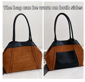 Detalle del diseño reversible del bolso de gamuza marrón y cuero negro para mujer