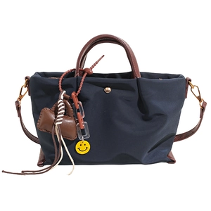 Casual nylon tote bag for women, lightweight waterproof commuter shoulder and crossbody bag.