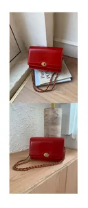Close-up of red leather flap bag featuring vintage gold twist lock and woven chain strap