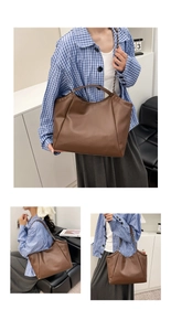 Détail du sac cabas en cuir marron foncé avec bandoulière en chaîne et cuir