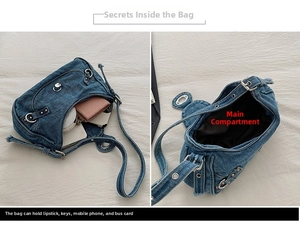 Detail view of denim shoulder bag interior showing main pocket storage capacity
