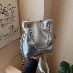 Women Minimalist PU Leather Bucket Bag Trendy Drawstring Shoulder Crossbody Bag With Silver Chain For Daily Street Style