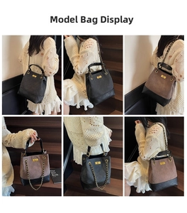 Close-up of quilted chain bucket bag showing black and brown leather textures and gold hardware