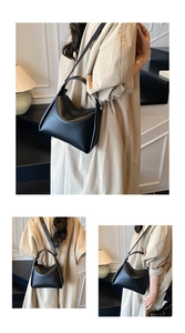 Détails d'un sac seau en cuir grainé noir avec des finitions métalliques argentées