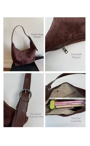 Detail view of brown suede hobo bag with adjustable strap and smooth zipper closure