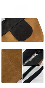 Detail of color-block tote bag showing suede texture, precision stitching, and metal zipper