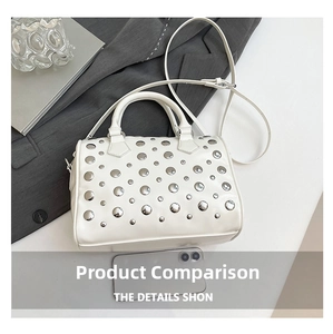 Detailed view of white punk boston bag with silver rivets and size comparison to phone