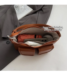 Interior view of caramel brown crossbody bag showing spacious storage for daily essentials