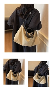 Detail of beige canvas tote bag showing black straps and versatile carrying styles