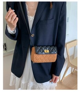 Quilted black leather and brown suede crossbody bag with gold-tone twist lock closure